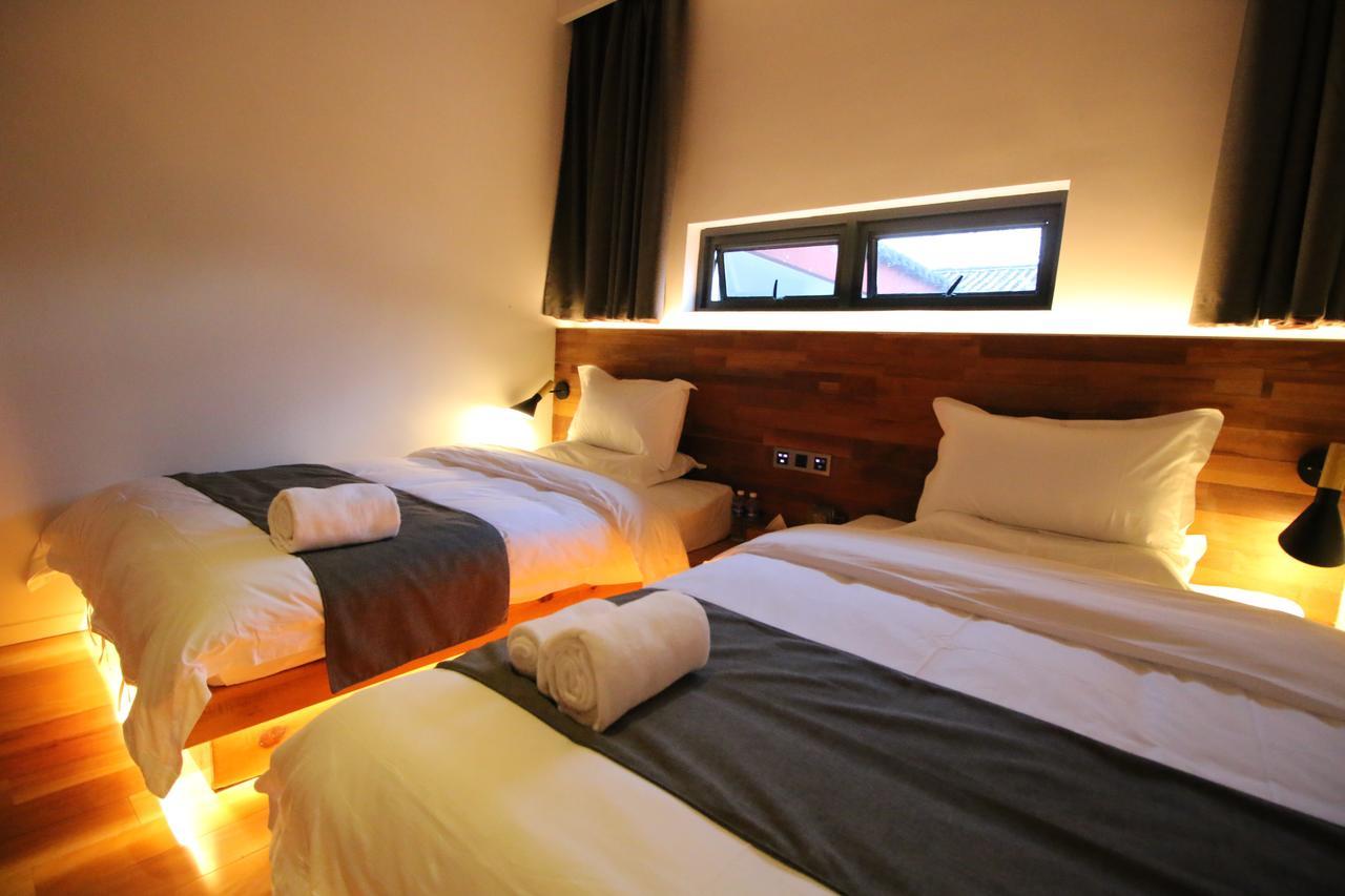 Lijiang Shuhe Travelling Hotel Экстерьер фото